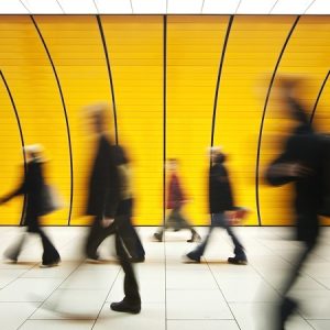 People walking through a station